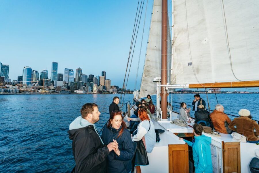 Seattle: Tall Sailboat Sunset Harbor Cruise - The hands-on sailing part: raising sails and taking the wheel